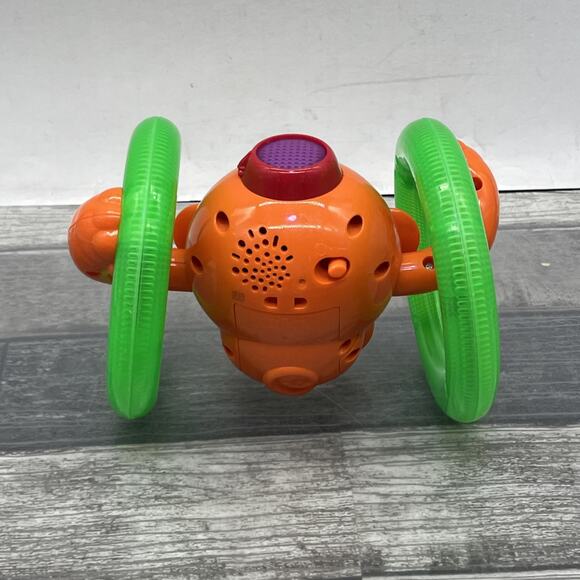 Bright Starts Roll & Glow Monkey Toy with Lights and Melodies, Ages 6M+ {1} - Picture 4 of 9